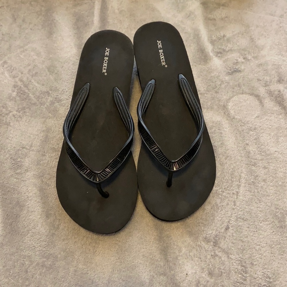 Black jeweled wedge flip flops